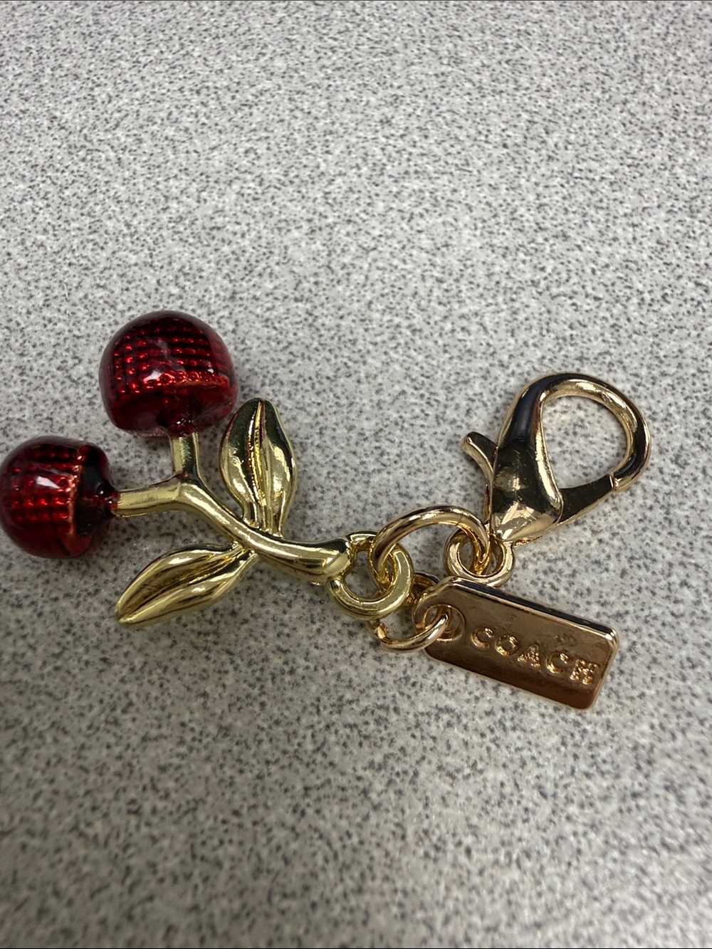 COACH Gold-Tone Cherry Charm Keyring with Red Enamel Cherries